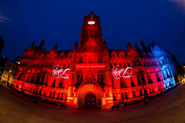 Manchester-town-hall-turns-red-for-derby-day-2526009